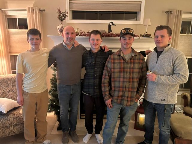 Brian Marchand with his four sons